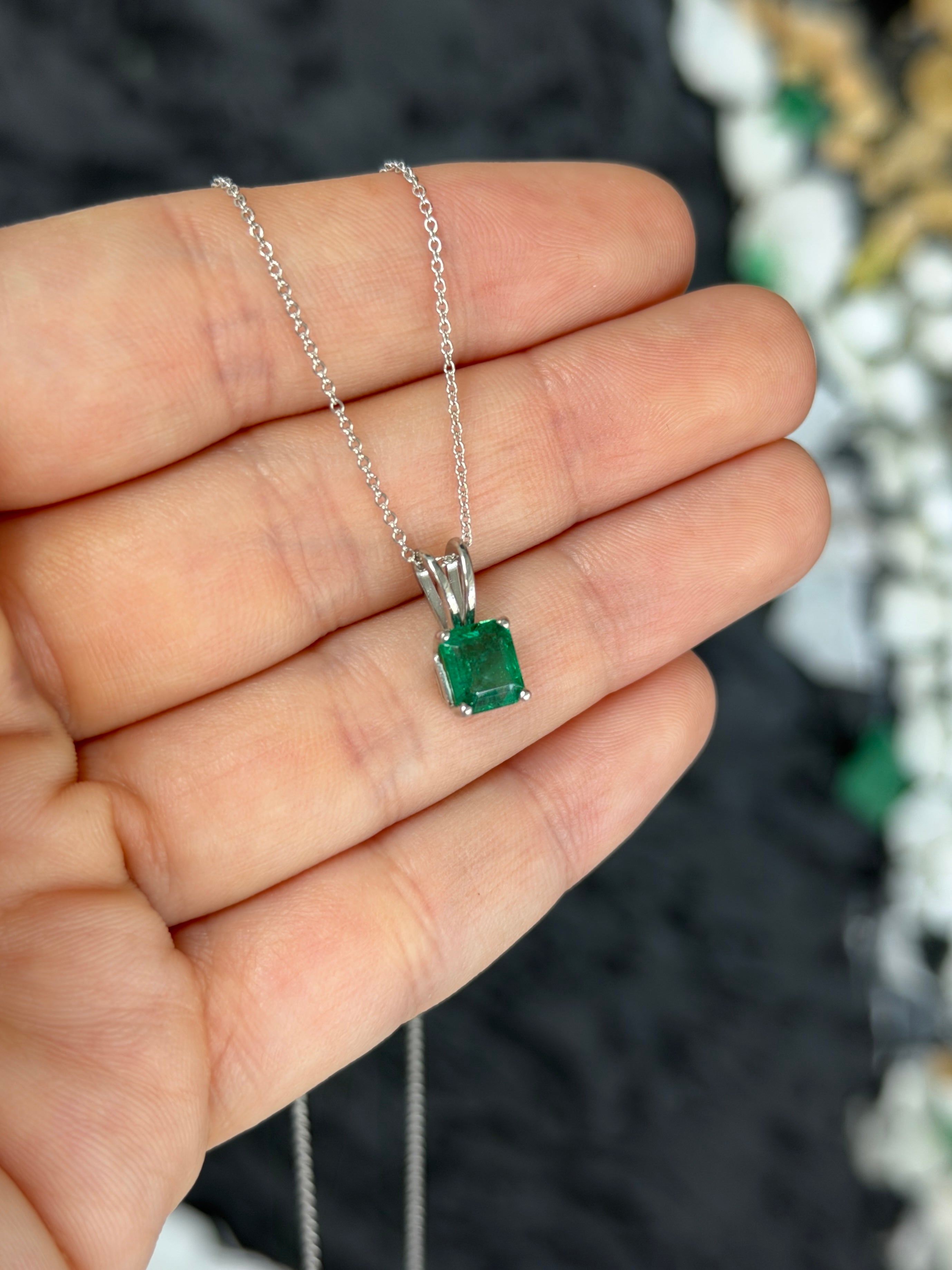Platinum necklace featuring a 2.10ct rich green Asscher cut emerald solitaire by JR Colombian Emeralds.