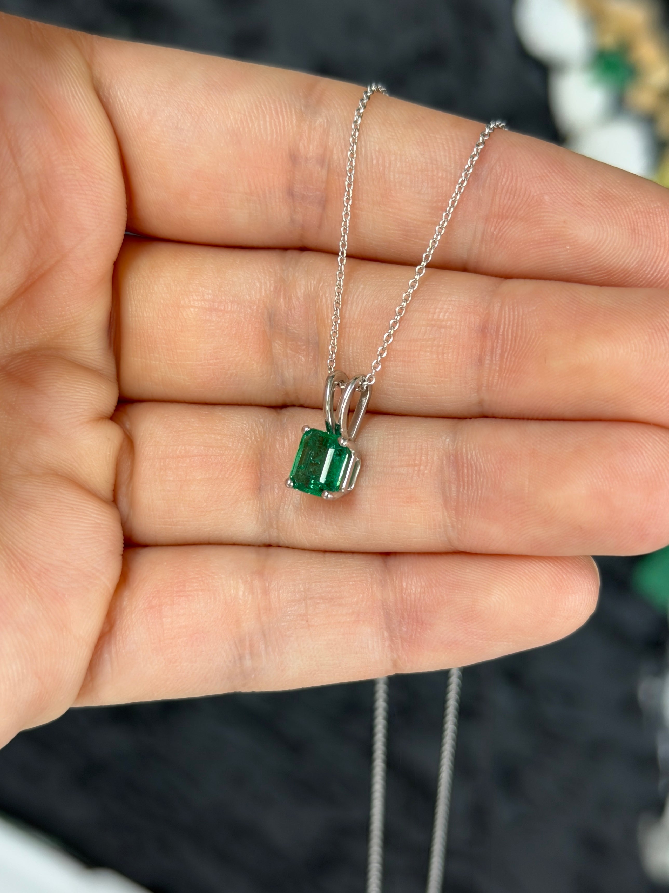 2.10ct platinum emerald solitaire necklace featuring a high-quality rich green Asscher-cut emerald by JR Colombian Emeralds