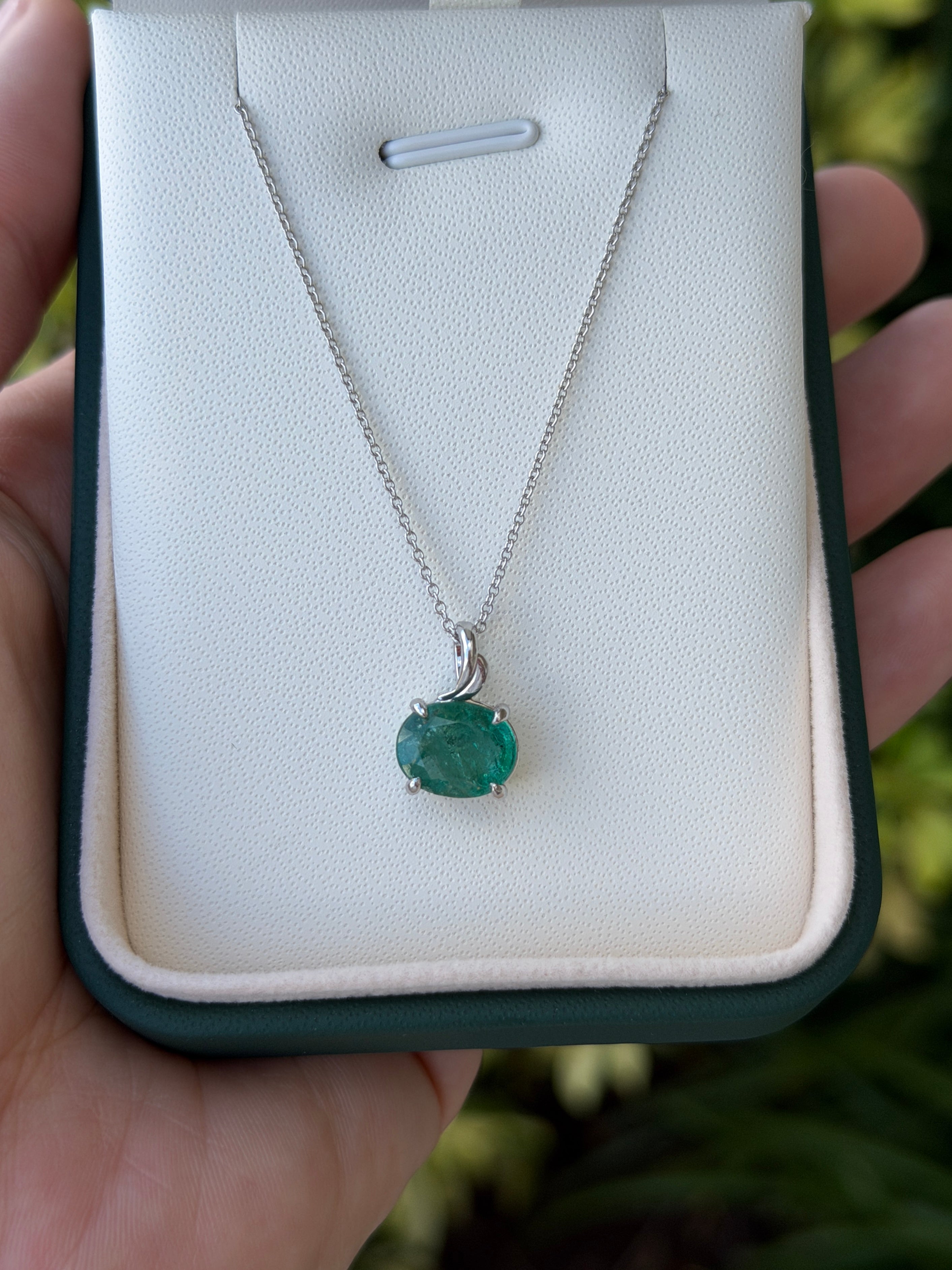 Emerald leaf pendant necklace with 2.60ct oval green emerald in 14K white gold, jewelry by JR Colombian Emeralds