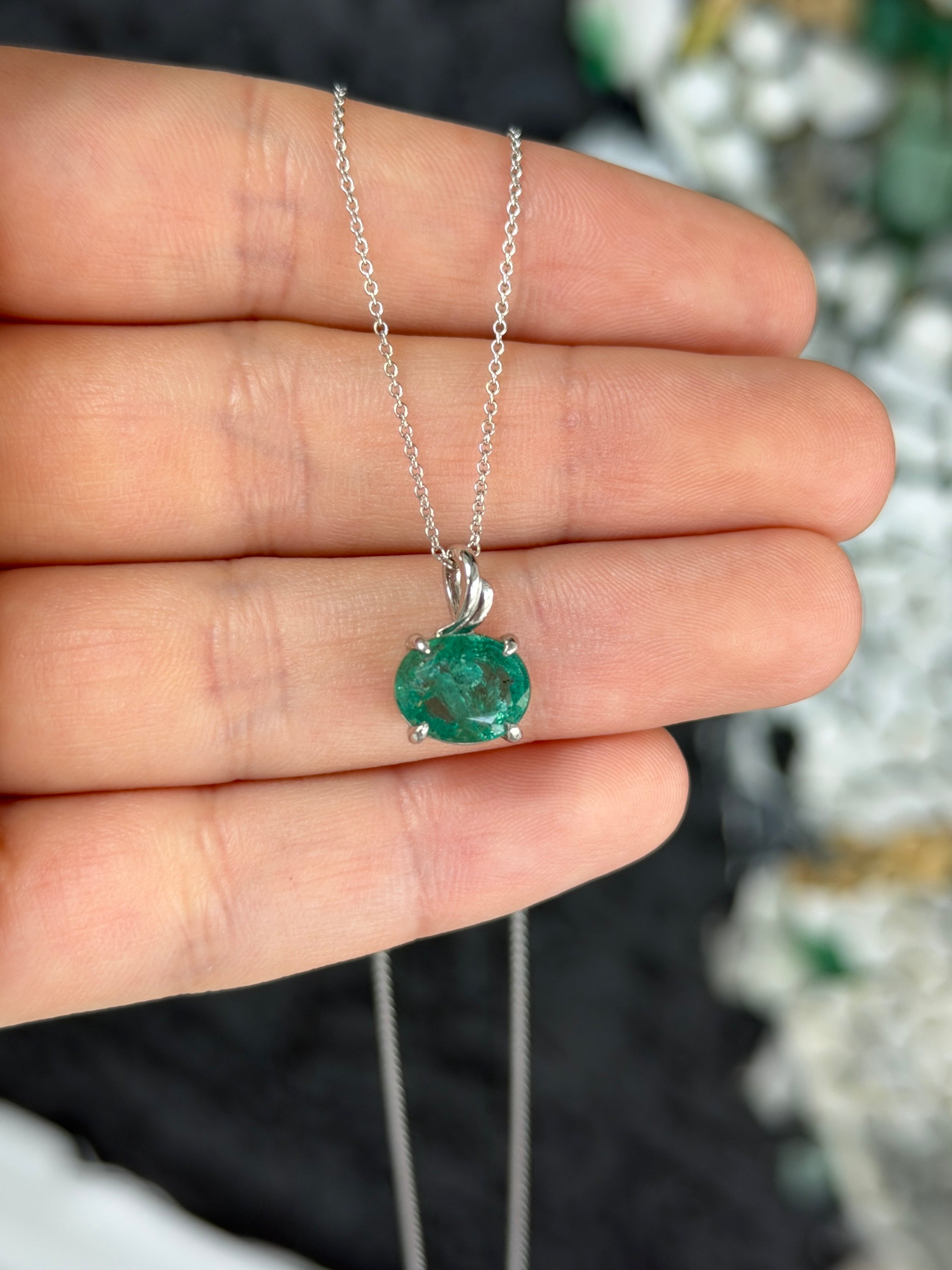 Earthy 2.60ct east-west oval emerald solitaire leaf pendant necklace in 14K white gold by JR Colombian Emeralds.