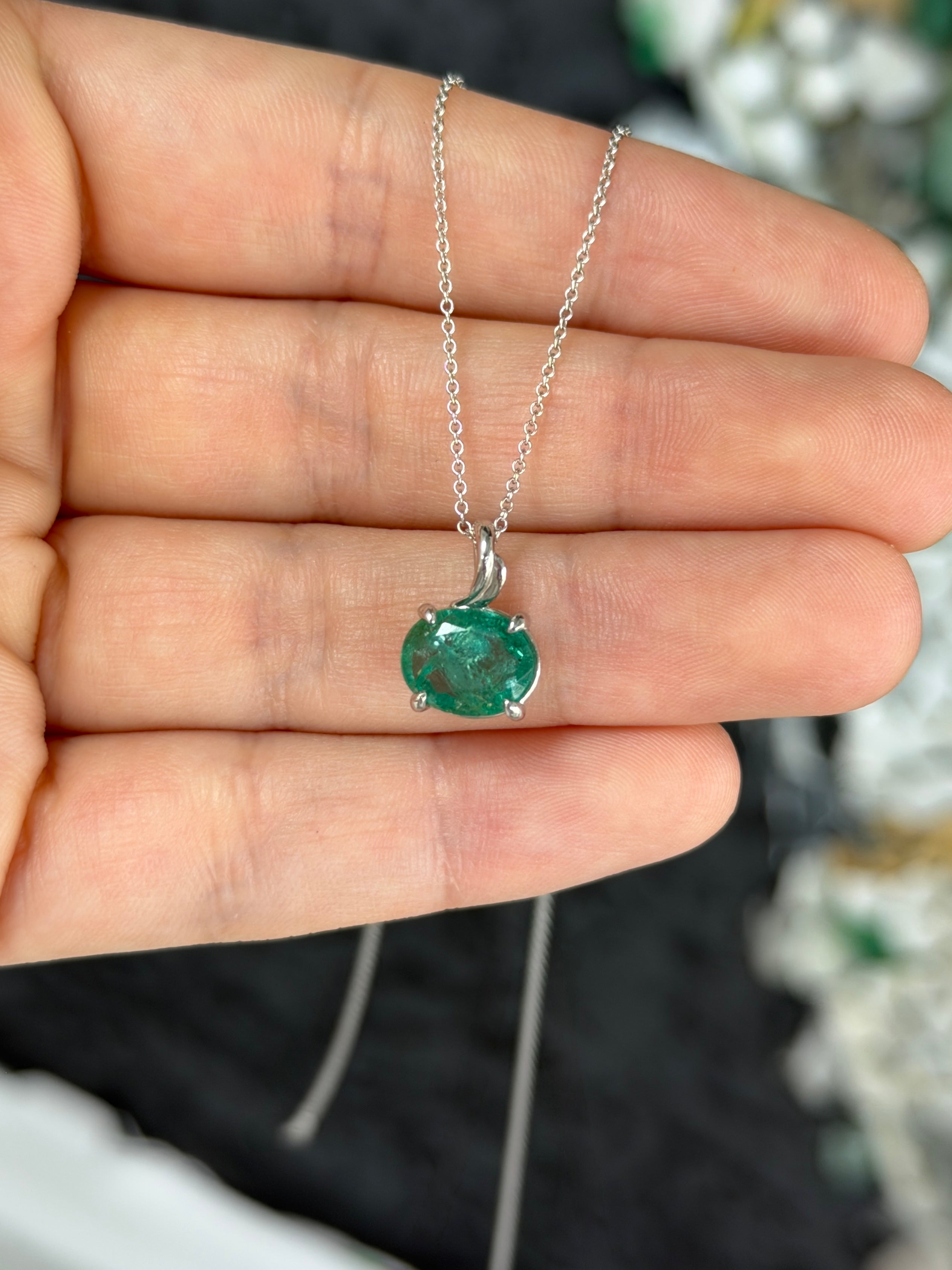 Earthy 2.60ct East-West oval emerald solitaire leaf pendant necklace in 14K white gold by JR Colombian Emeralds.