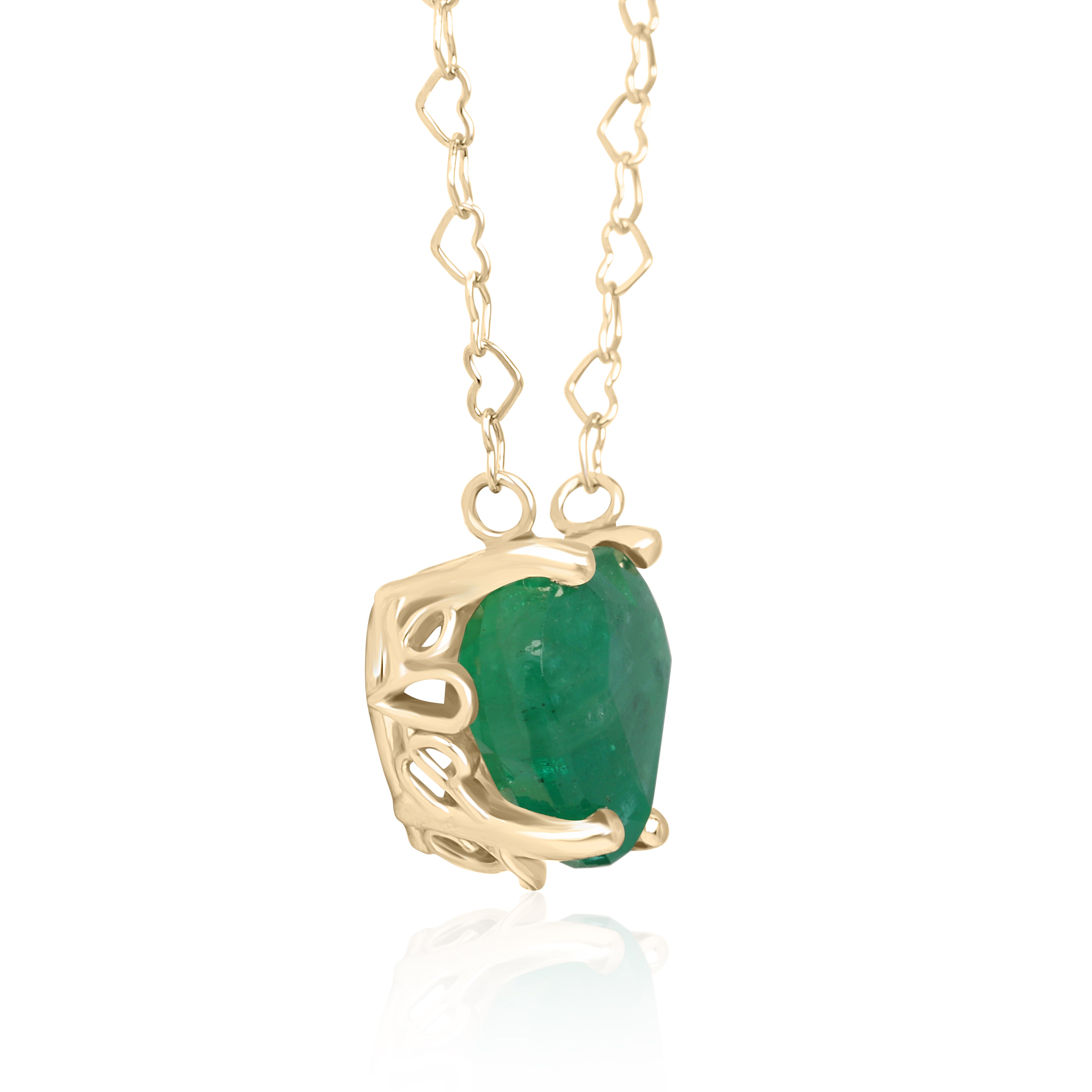 Natural Zambian emerald heart solitaire necklace with 4.07cts, featuring JR Colombian Emeralds branding and a delicate chain.
