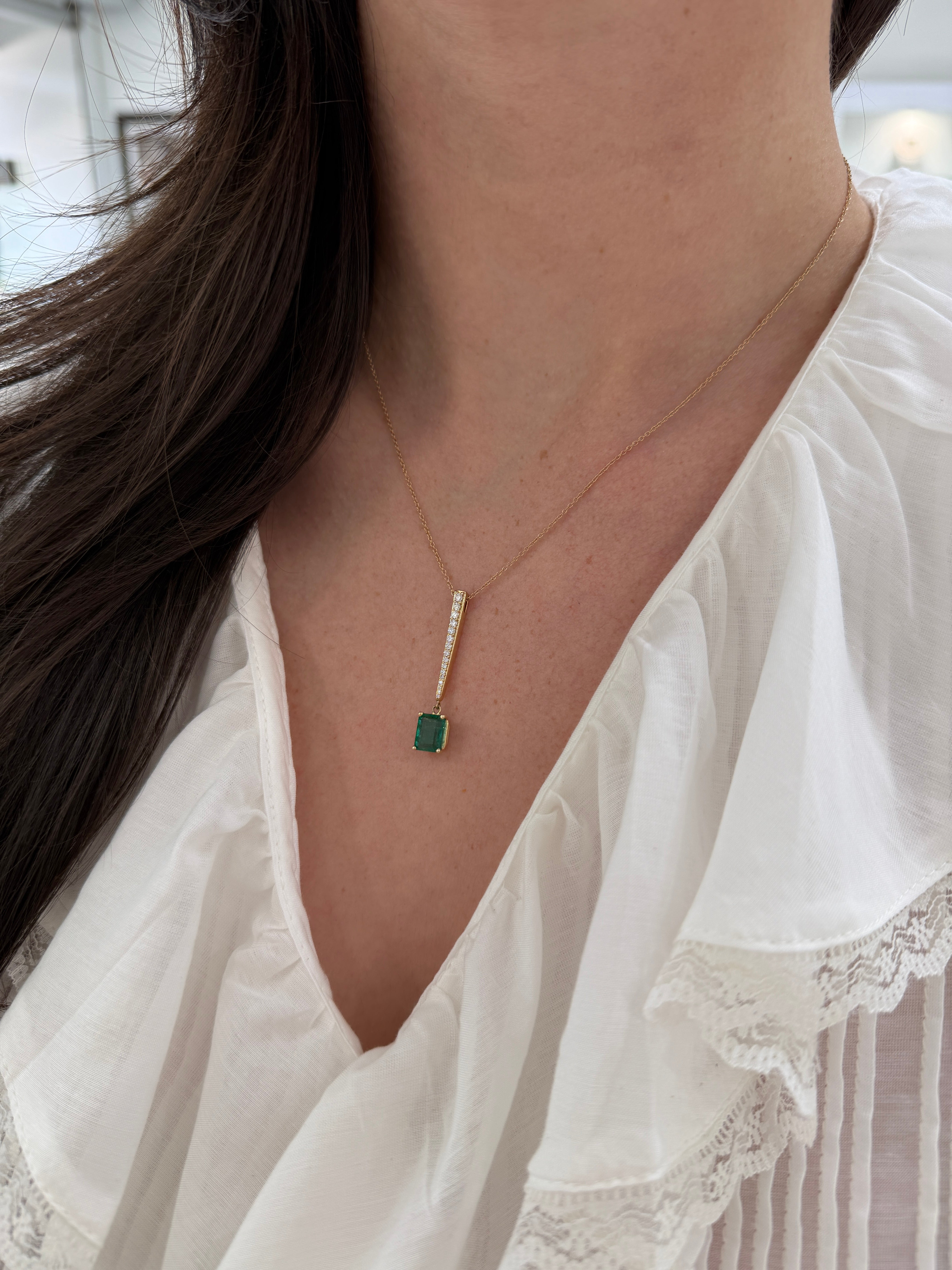 14K natural emerald cut emerald and diamond V-drop pendant necklace with diamond accents, featuring 2.68 tcw from JR Colombian Emeralds