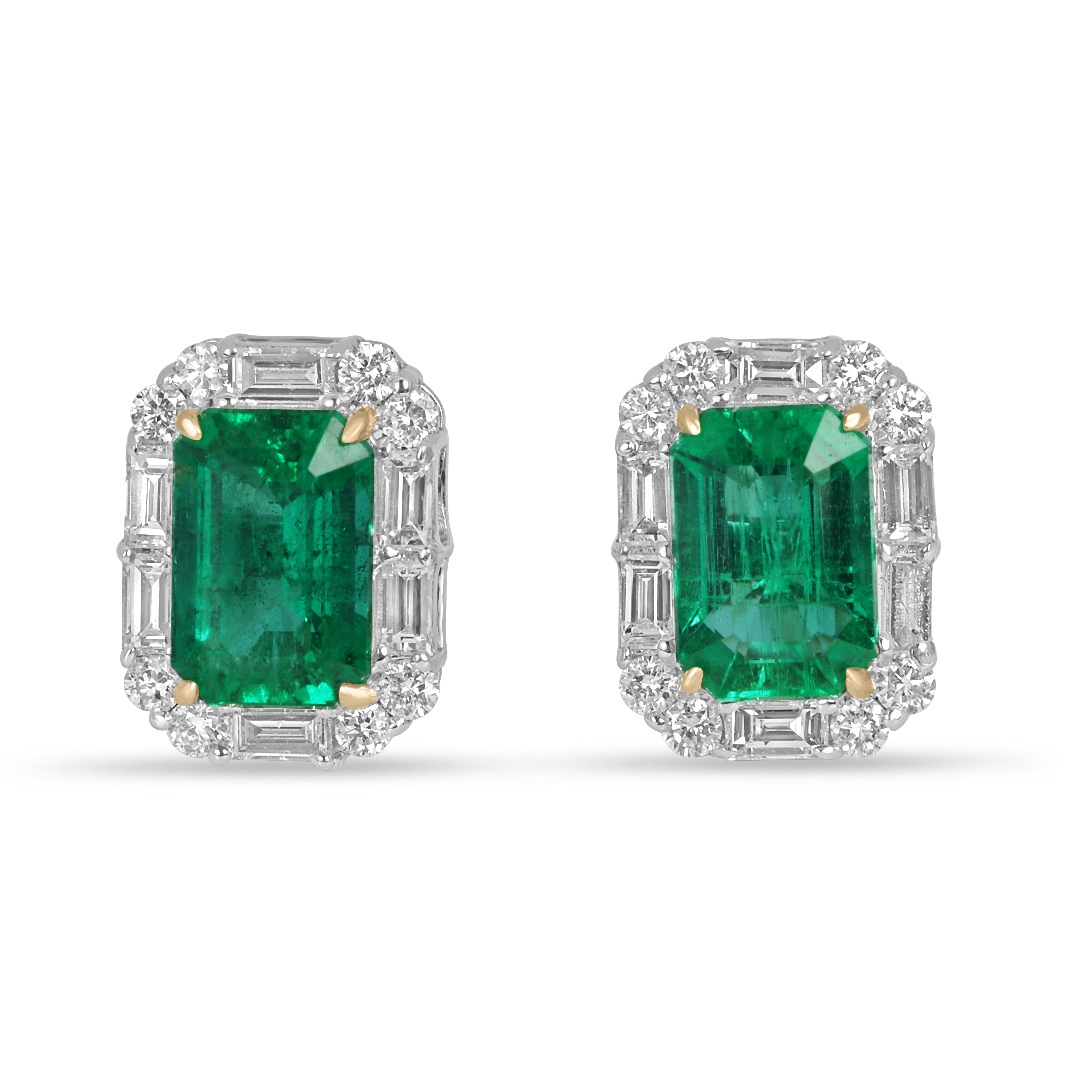 Natural emerald and baguette diamond halo stud earrings in 18K two-tone gold, featuring 1.59tcw fine quality gemstones.