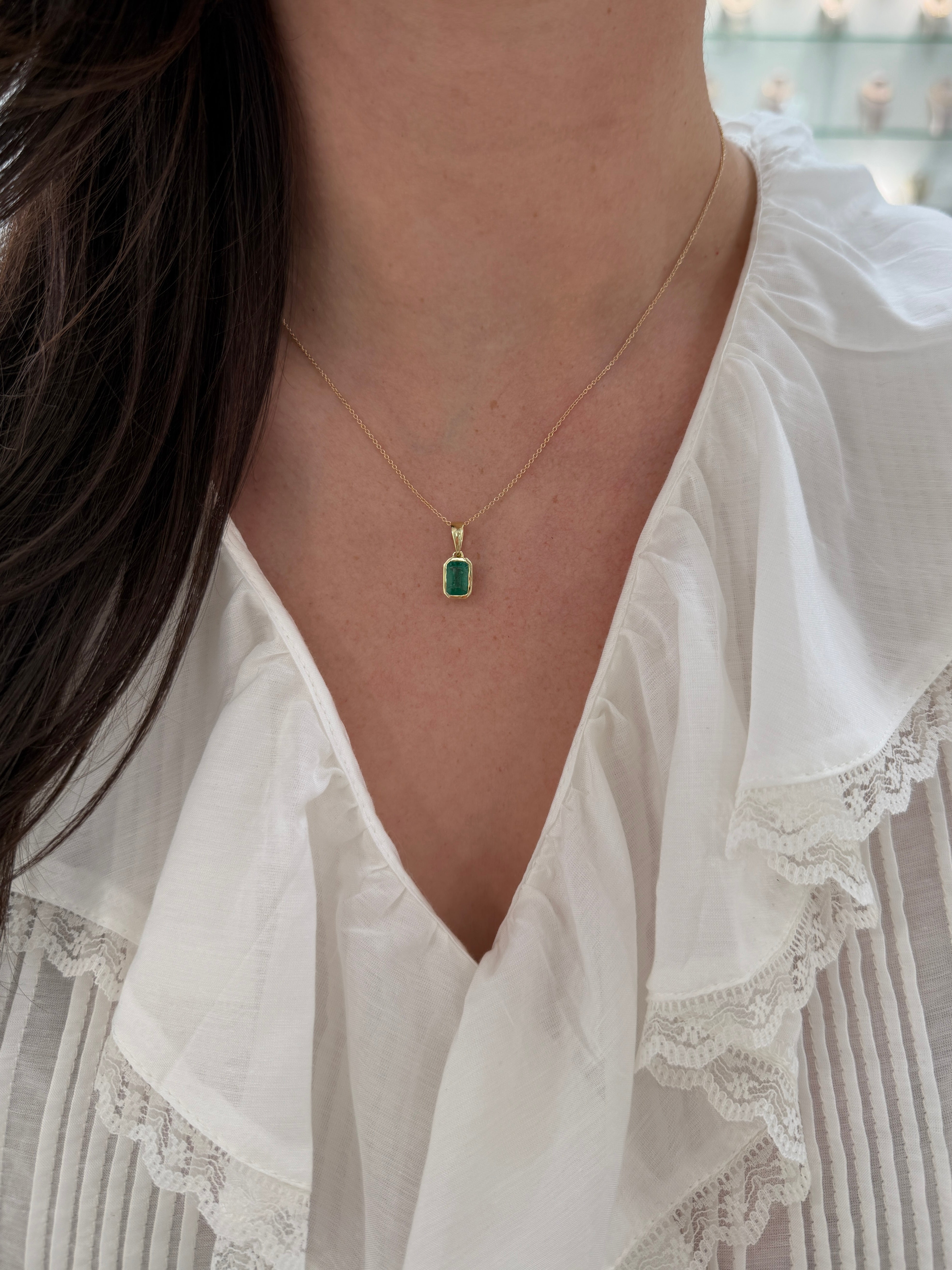 14K natural emerald bezel necklace with large bail, featuring a 1.80ct emerald pendant by JR Colombian Emeralds.
