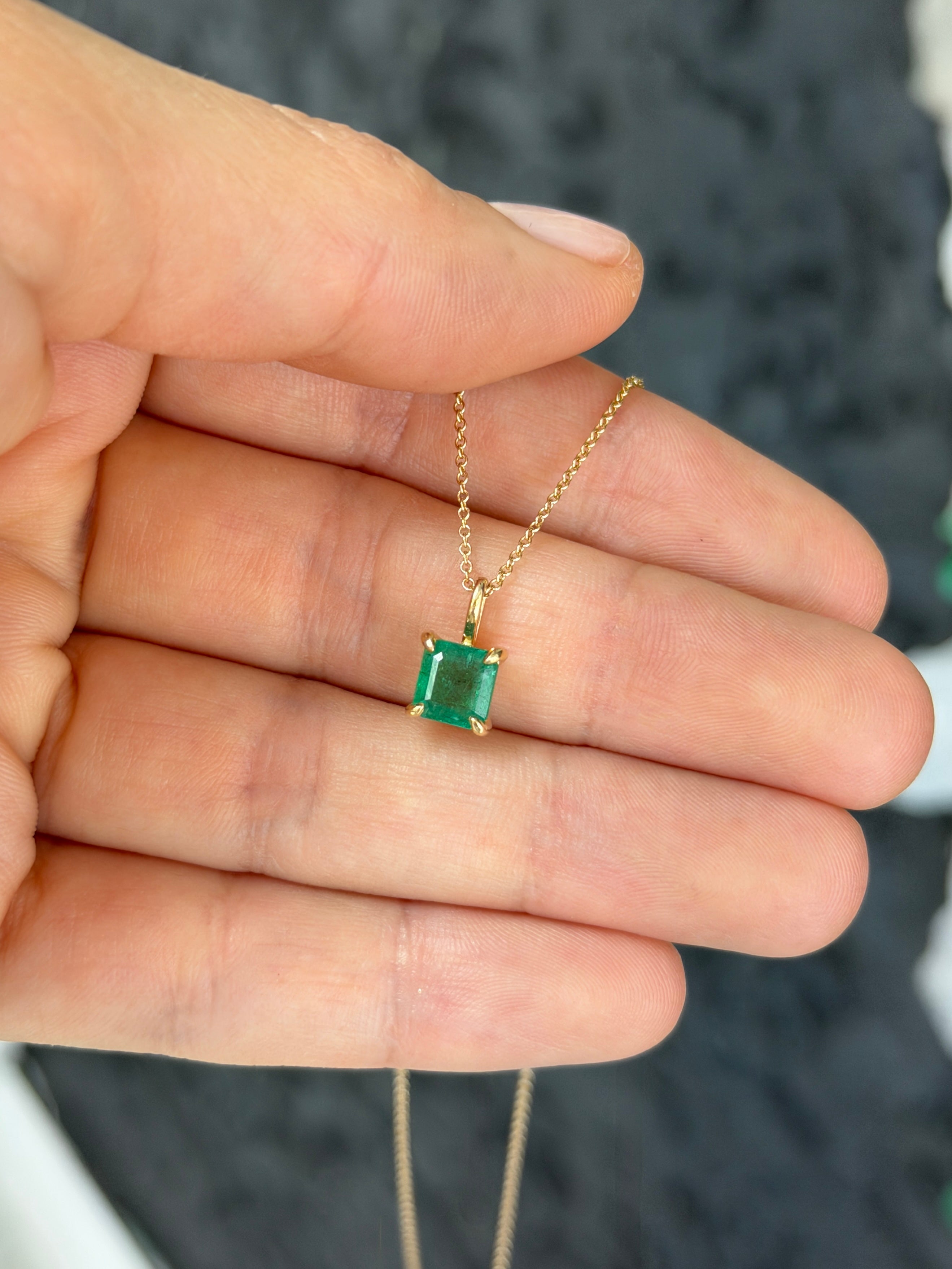 Petite 1.35 Carat Asscher Emerald Solitaire Necklace in 14K gold by JR Colombian Emeralds, featuring a stunning emerald gemstone.