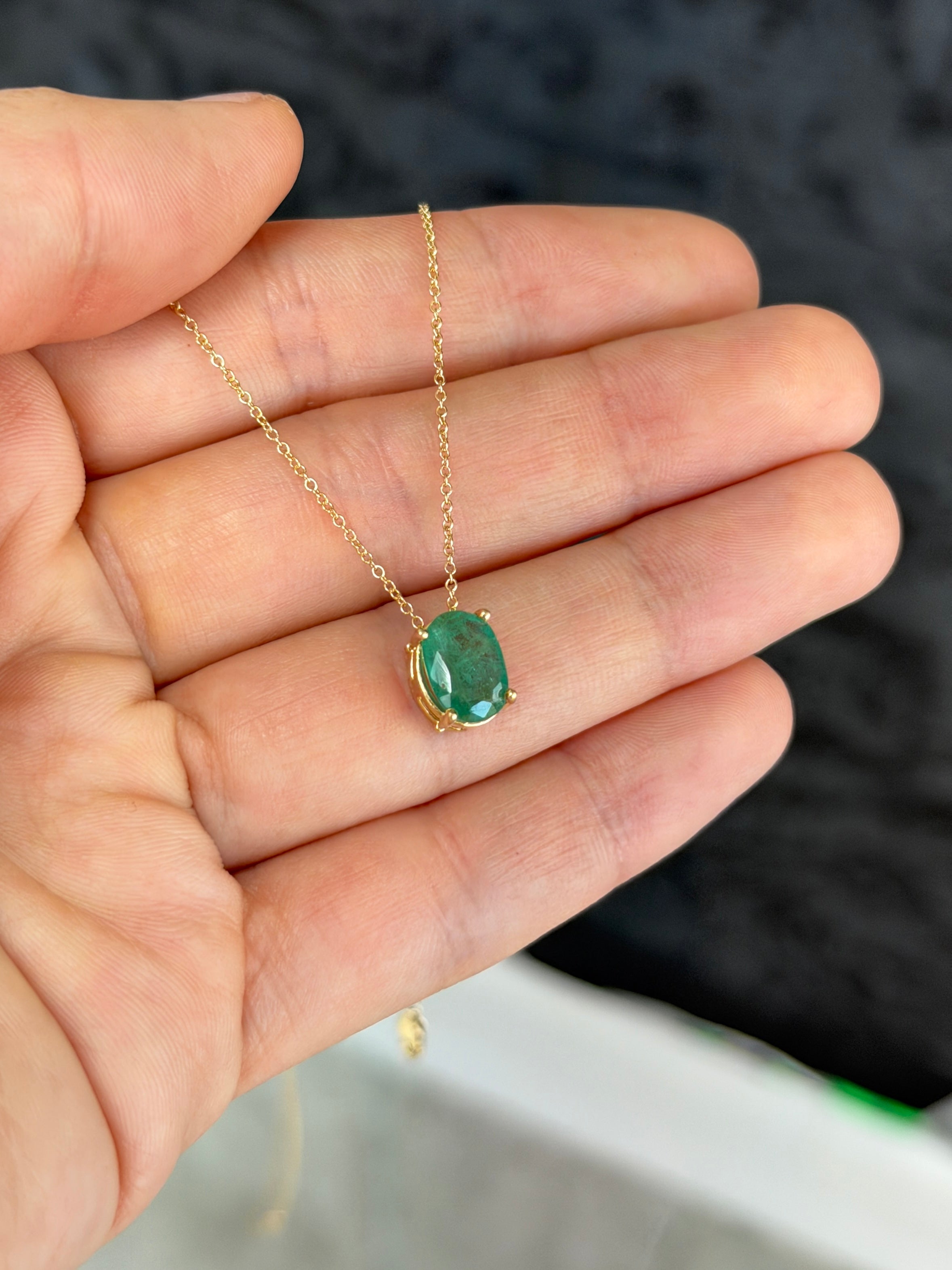 Emerald oval slider necklace with 2.15 carat solitaire emerald by JR Colombian Emeralds, set in 14K gold.