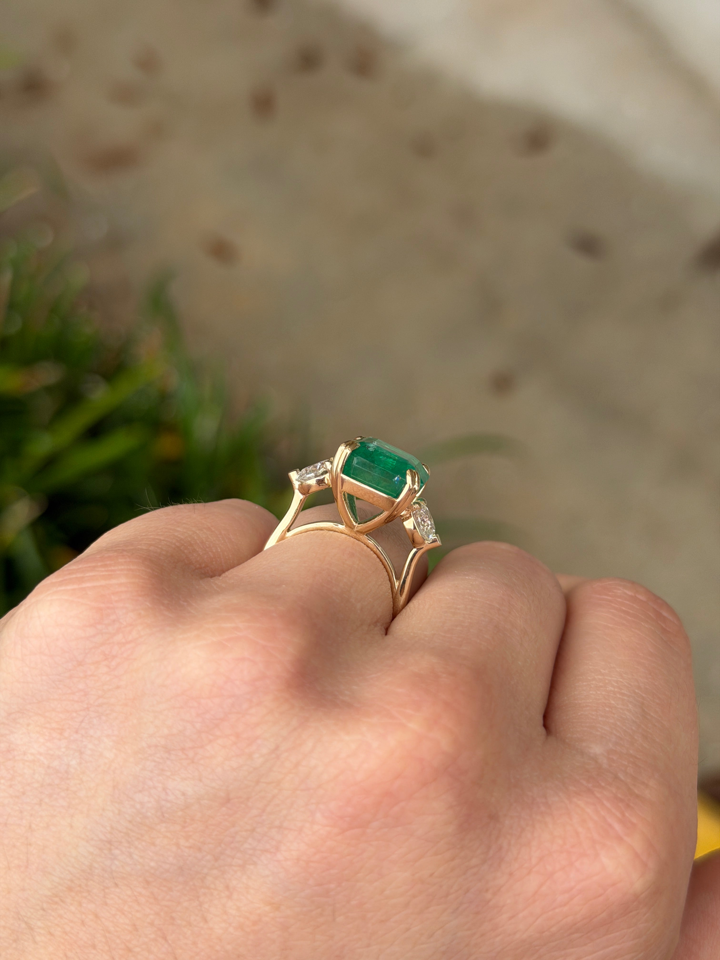 Three stone Asscher cut emerald engagement ring with round lab diamonds, 14K gold cathedral setting by JR Colombian Emeralds.
