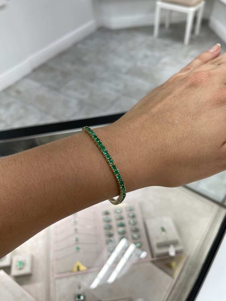Medium dark green round cut emerald tennis bracelet with 14K setting by Colombian Emerald, unisex jewelry with 6.0 tcw.