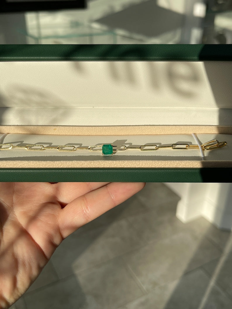 14K Colombian Emerald bracelet featuring a 1.80ct dark green Asscher cut emerald in a paperclip square design with 4-prong setting.