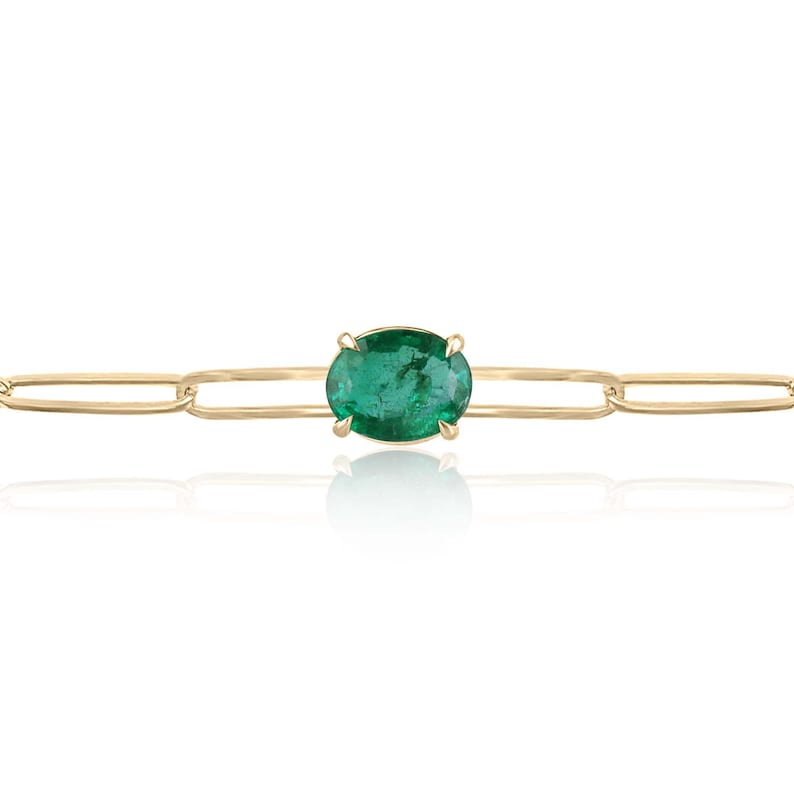 14K Colombian Emerald bracelet with a 2.10ct oval cut emerald in a four-prong paperclip design, lush dark green gemstone.