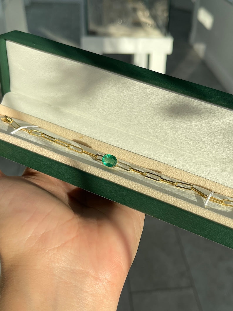 Colombian Emerald 2.65ct oval cut bracelet with natural dark green emerald in 14K gold paperclip design and four-prong setting