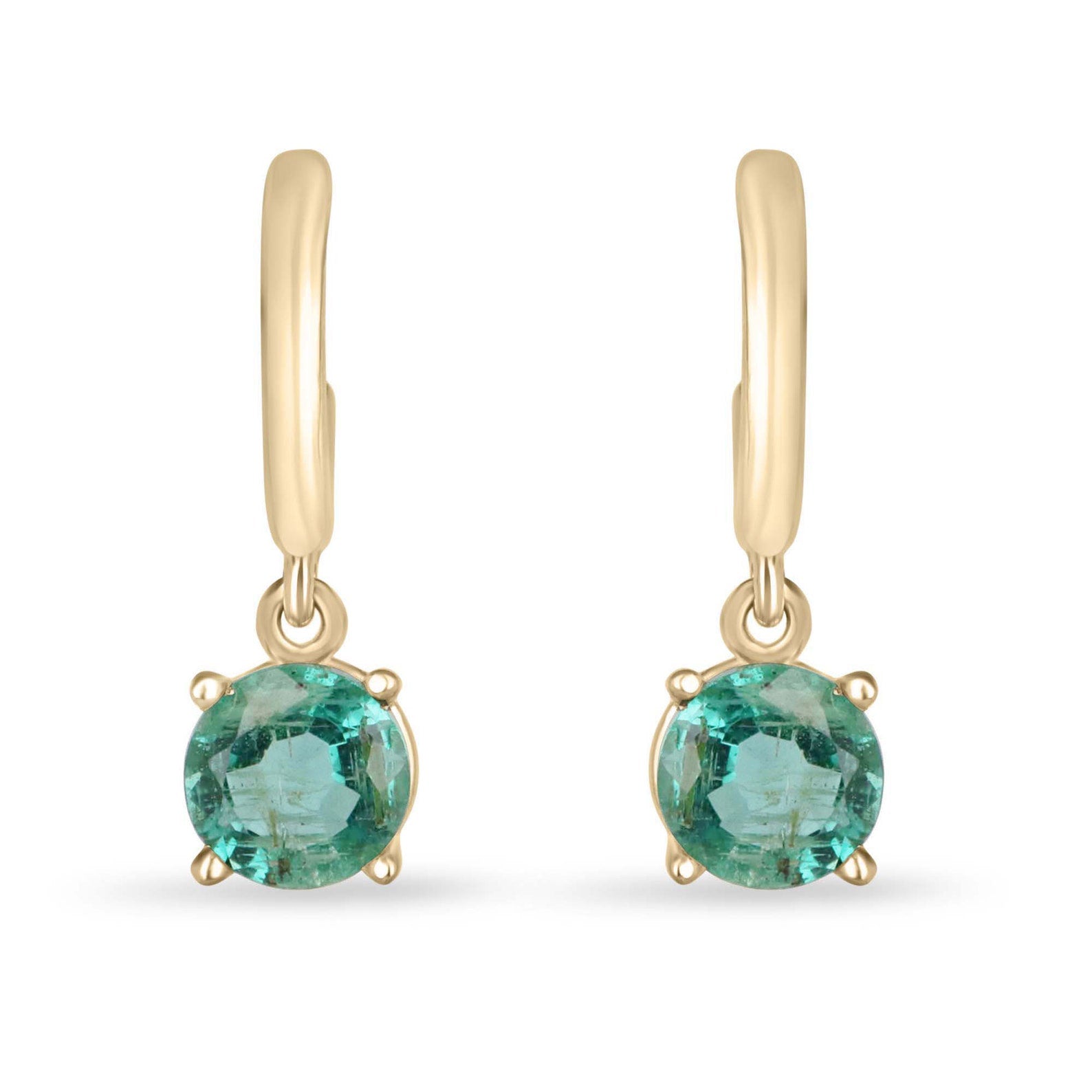 Medium dark green emerald round cut huggie hoop earrings with four prongs in 14K gold by Colombian Emerald, close-up of earrings.