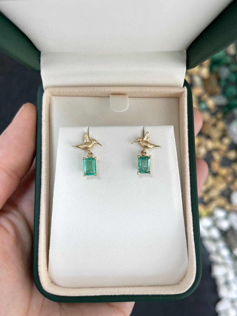 Colombian Emerald 14K gold hummingbird dangle stud earrings with natural emeralds, 1.90tcw, detailed gold bird design.