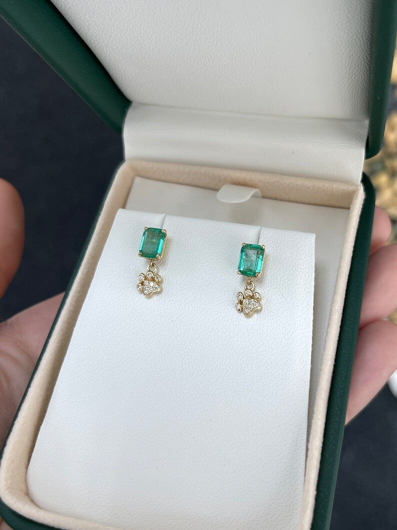 14K emerald and diamond dog paw print stud earrings featuring 2.36tcw from Colombian Emerald, showcasing intricate craftsmanship.