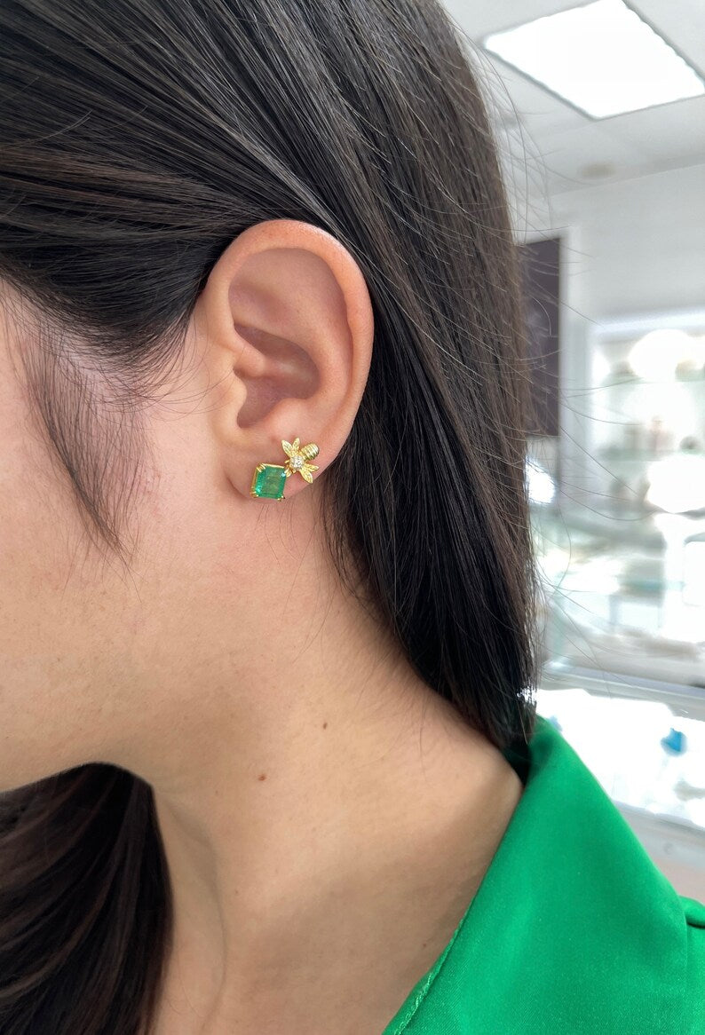 14K gold emerald Asscher cut bee ear climber earrings with 3.65tcw from Colombian Emerald, featuring unique design and intricate details.