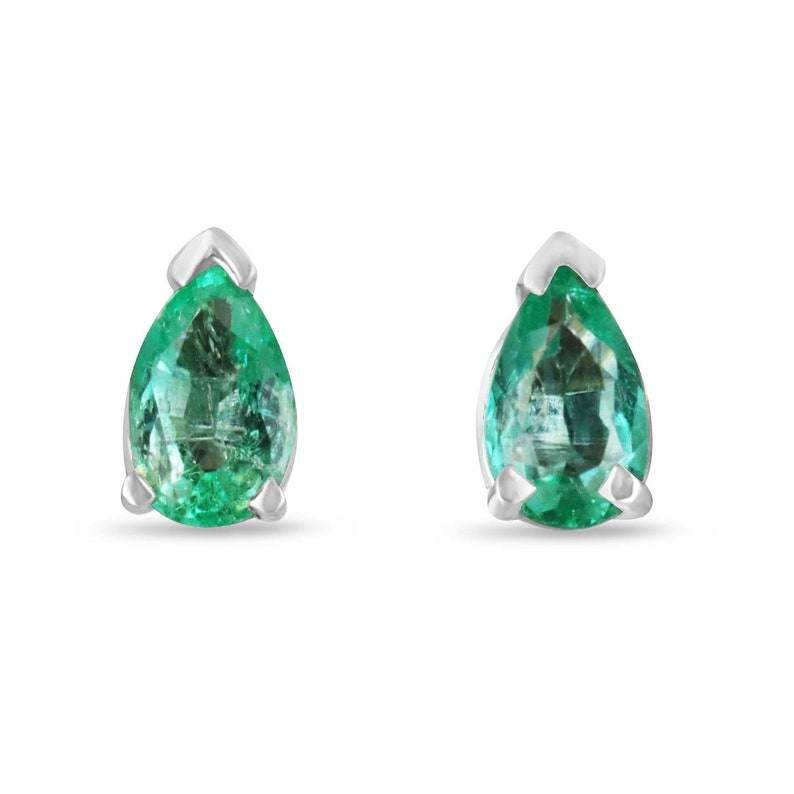 Pair of 0.70tcw 14K white gold pear cut emerald stud earrings with three-prong setting