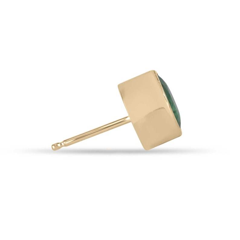 Pair of 14K gold unisex emerald stud earrings featuring round-cut lush green Colombian emeralds, 2.82 carats total weight.