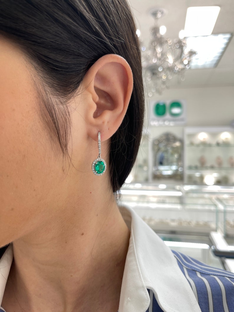 Stunning 4.04tcw Emerald & Diamond Dangle Earrings Set in 14K White Gold