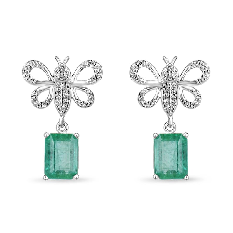 Colombian Emerald 14K gold butterfly dangle earrings with medium green emeralds and pave diamond accents, elegant jewelry accessory.