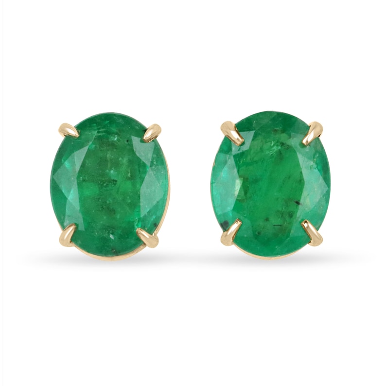 Colombian Emerald 4.85tcw 18K gold oval cut dark green stud earrings with four-prong claw setting