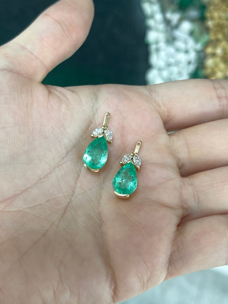 Colombian Emerald earrings with pear-cut green teardrop emeralds and marquise diamonds in floral earring jackets, 7.97 tcw.