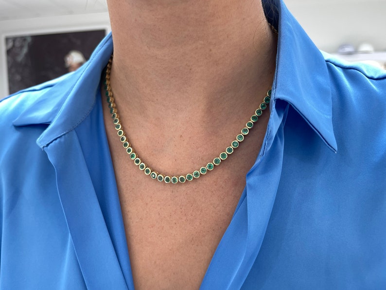 14K natural round green emerald tennis necklace with bezel setting, 25.50 tcw, from Colombian Emerald brand.