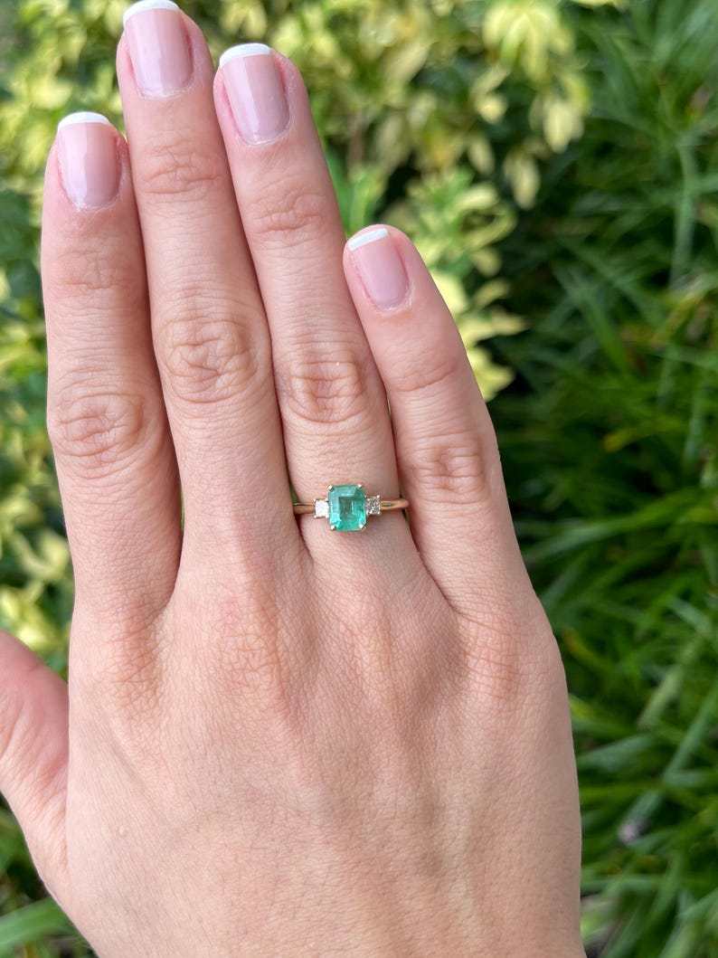 1.08tcw Emerald Cut & Diamond Three Stone May Birthstone Ring 14K