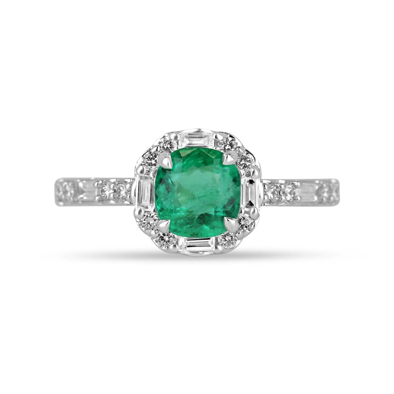 14K Colombian Emerald engagement ring with a 1.55tcw vivid green cushion cut emerald and diamond halo featuring round and baguette diamonds