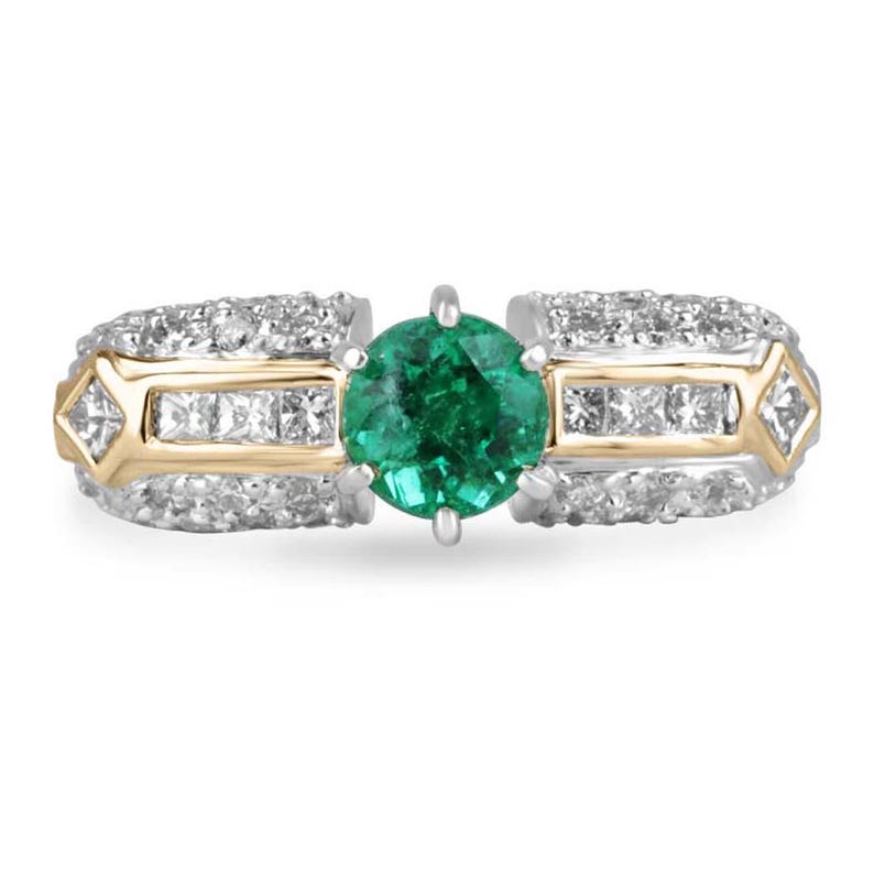18K gold engagement ring with a 1.85 carat round cut Colombian emerald and diamond accents, showcasing elegant jewelry craftsmanship.