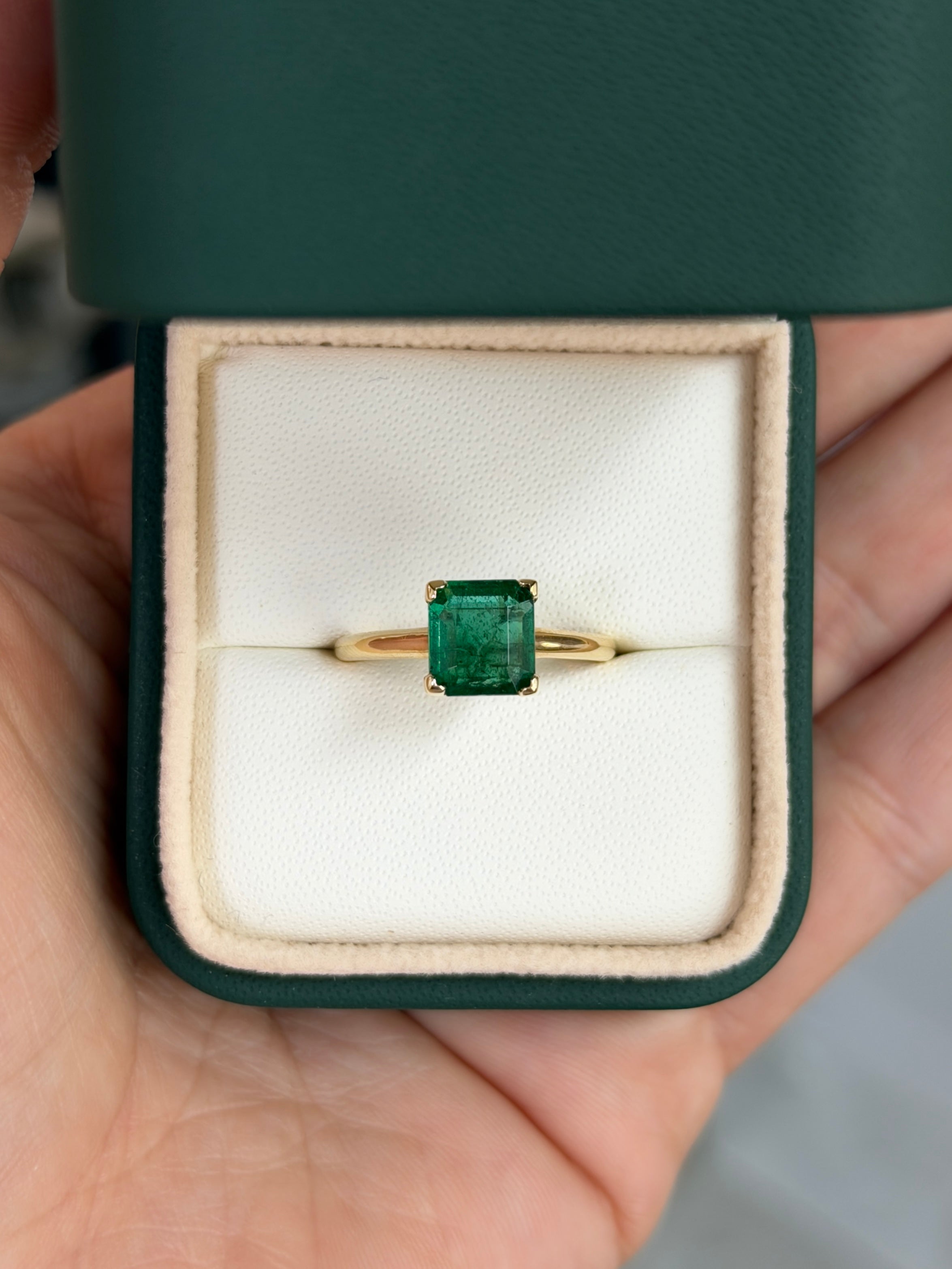 Deep green 1.99ct Asscher cut emerald solitaire engagement ring with V prong setting in 14K gold by Colombian Emerald.