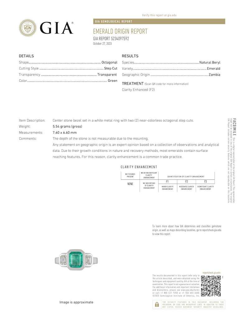 14K gold engagement ring with three natural emerald cut diamonds totaling 2.25 carats, featuring Colombian emerald accents.