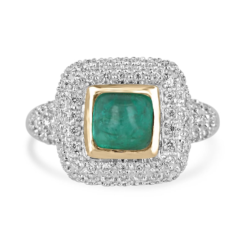 Colombian Emerald engagement ring featuring a 2.54tcw cluster sugarloaf emerald with diamond accents in a 14K halo setting.