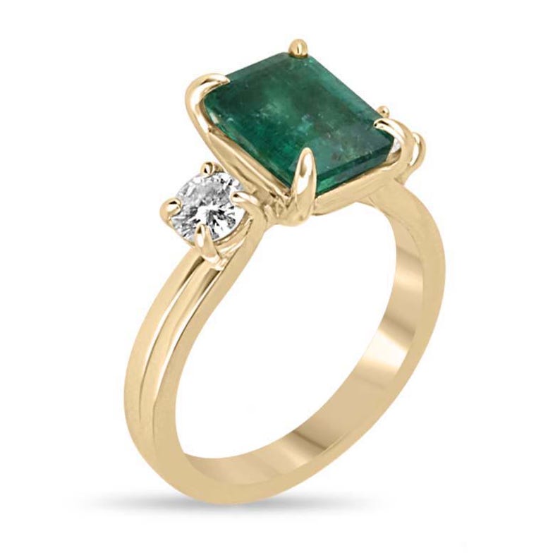 14K Colombian Emerald and diamond convertible engagement ring with 3.30tcw, featuring a three-stone design and natural gemstones.