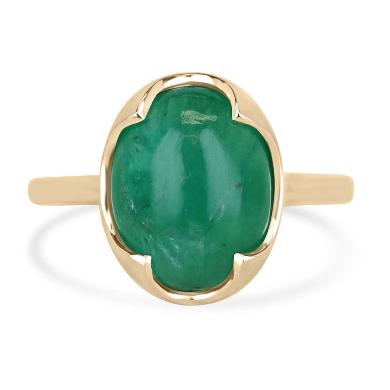 14K dark green emerald solitaire engagement ring featuring a 4.29ct oval cabochon Colombian emerald in a domed setting