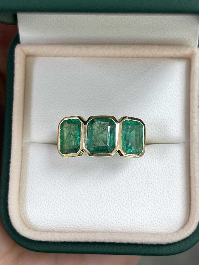 4.40tcw Bezel Set Emerald Cut Trilogy Ring Vintage Scroll Detail 14K Y