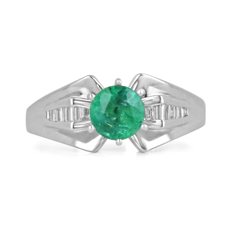 Colombian Emerald ladies ring with 1.25tcw diamonds, 18K white gold, round emerald center, tapered baguette accents, 6-prong setting