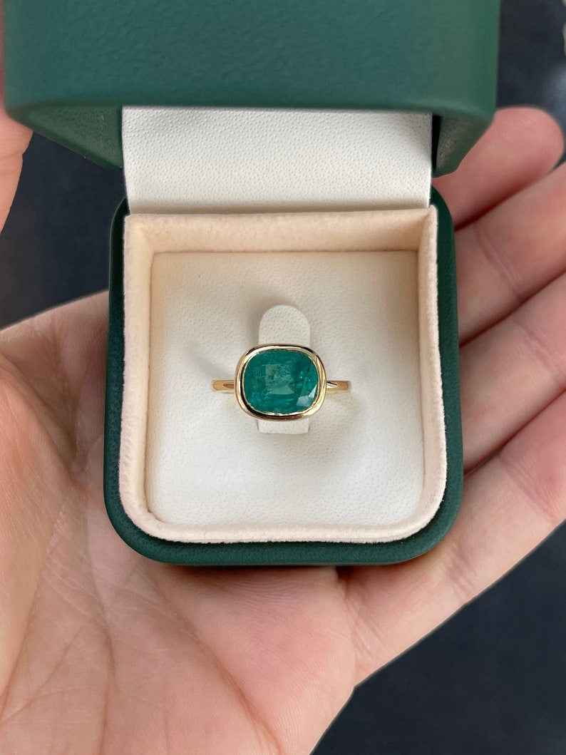 Deep ocean green cushion cut emerald engagement ring in 14K gold, featuring a Colombian emerald for ladies' jewelry.