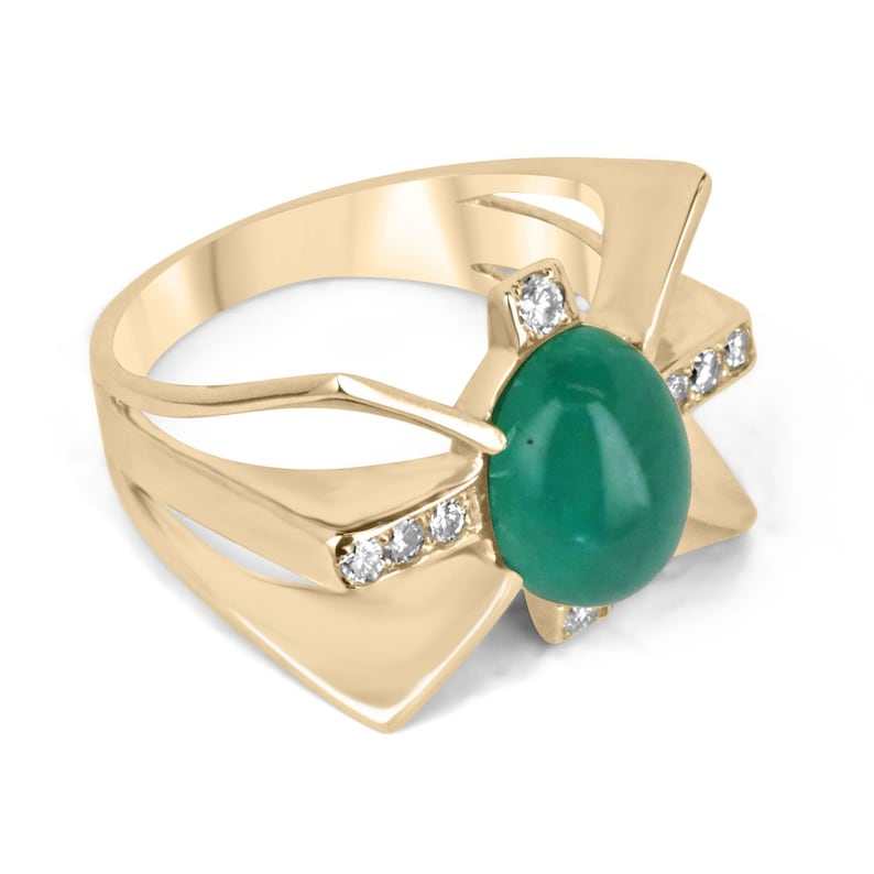 Ladies emerald ring featuring a 5.12 carat green cabochon emerald with diamond accents in gold star style, by Colombian Emerald.
