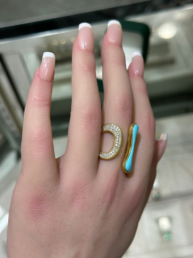 Ladies 14K gold ring featuring 0.40tcw pave diamonds, irregular turquoise, and an open statement design by Colombian Emerald.