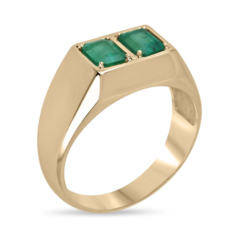 Men's 14K gold bezel ring featuring two emerald-cut Colombian emeralds, chunky unisex design, 2.03 carats total weight.