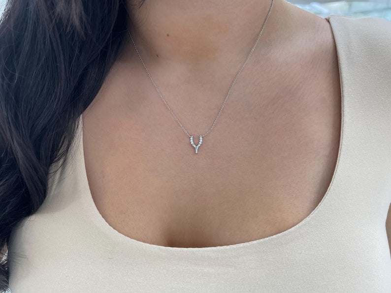 14K gold Y-shaped horse shoe diamond pendant necklace with white gold finish, featuring 0.10tcw diamonds from Colombian Emerald.