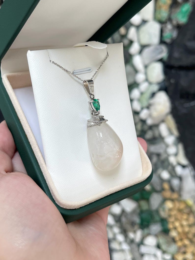 Natural pear cut emerald and quartz baroque pendant necklace in lush green, from Colombian Emerald brand.