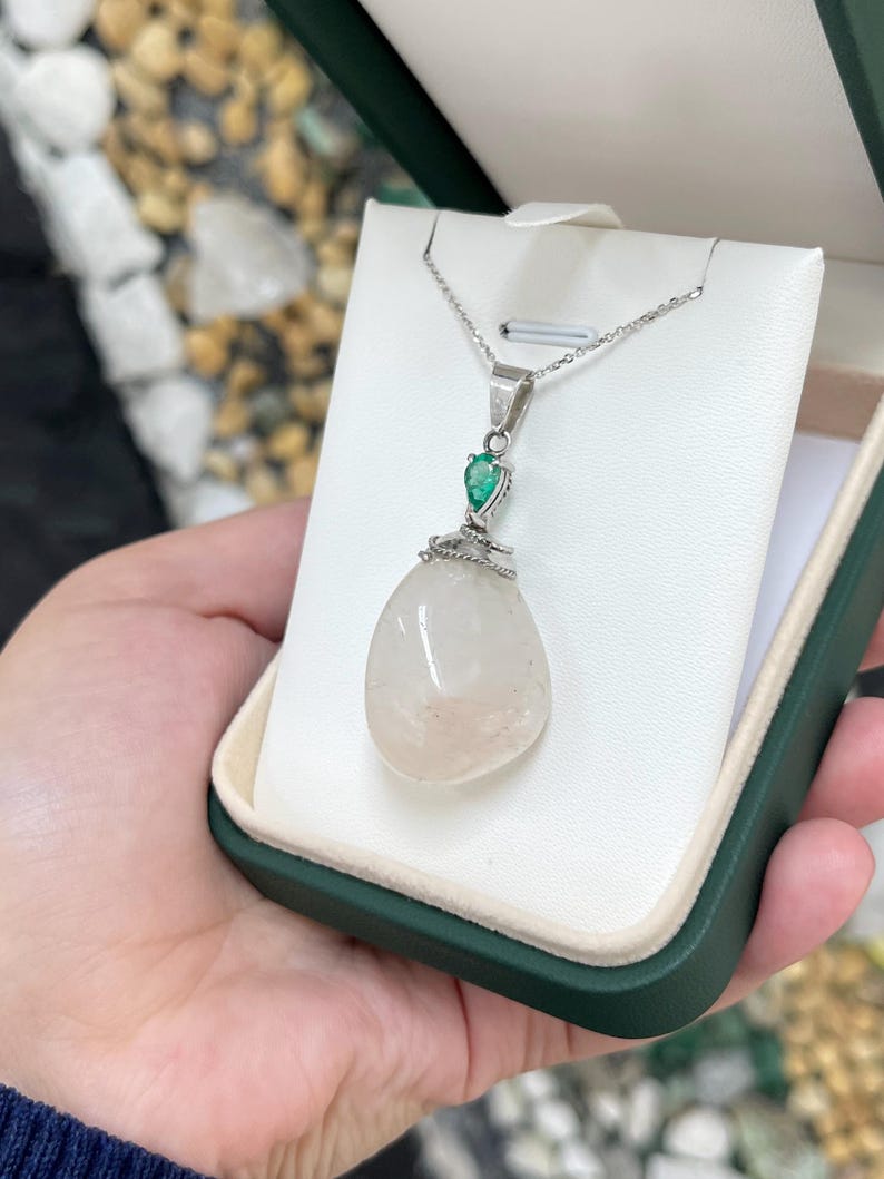 Lush green necklace with 0.78ct pear cut emerald and quartz baroque pendant by Colombian Emerald, showcasing vibrant gemstones.