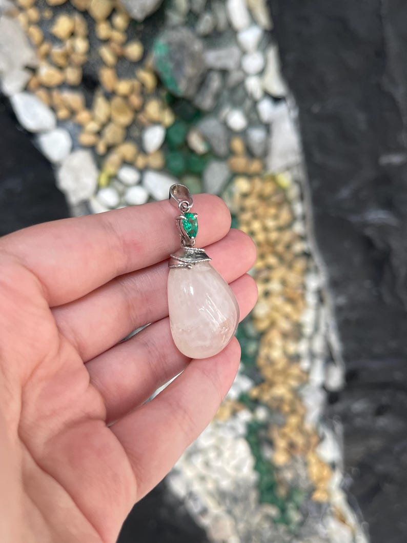 Lush green necklace featuring a 0.78ct pear-cut emerald and quartz baroque pendant, natural Colombian emerald brand.