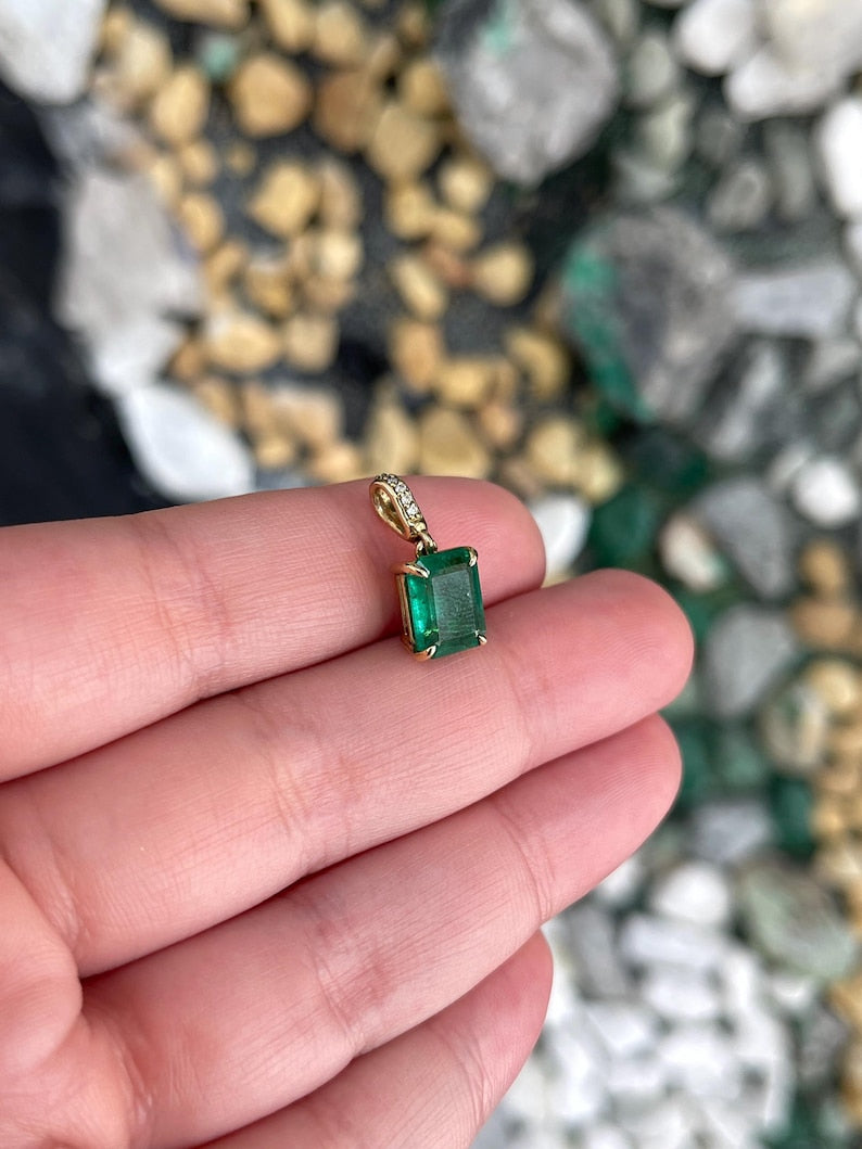 14K emerald cut emerald pendant necklace with diamond accents, featuring a lush dark green design by Colombian Emerald.