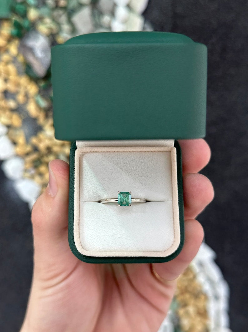 Sterling silver ring featuring a 0.90 carat natural spring green Asscher cut emerald solitaire from Colombian Emerald.
