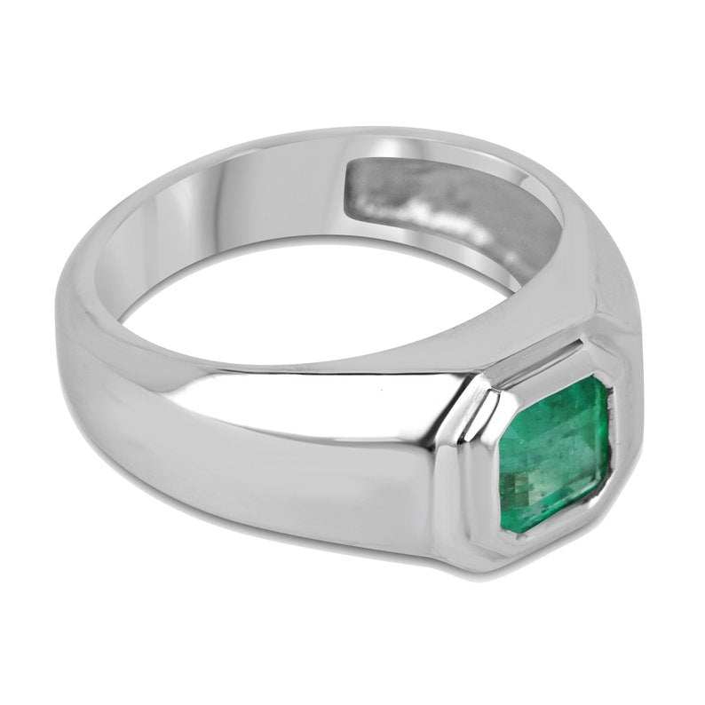 Men's silver ring with a 0.90 carat vivid medium green emerald, accented with pink details, from Colombian Emerald collection.