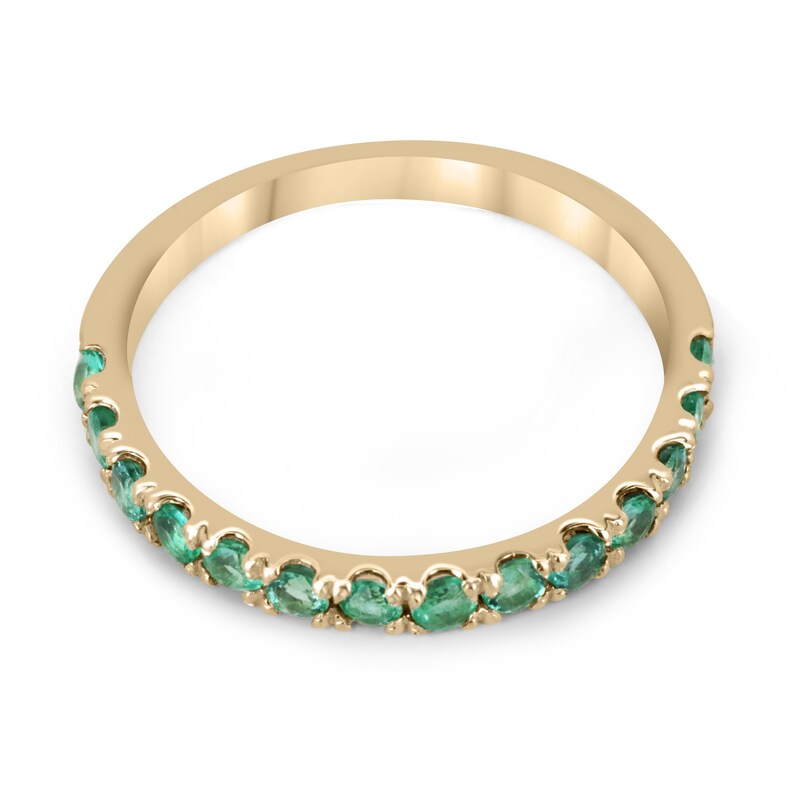 Medium dark green round cut emerald half eternity band ring in 14K gold with 0.90tcw from Colombian Emerald.