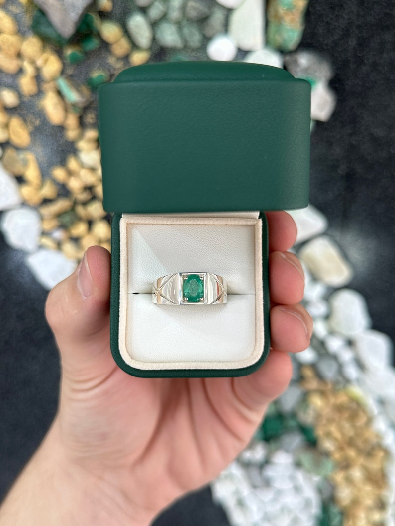 Sterling silver men's ring with 1.13 carat lush green oval cut solitaire emerald from Colombian Emerald.